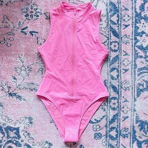 SKIMS Swim Zip Front Sleeveless One Piece in Light Pink in S
